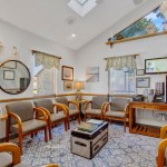 Comfortable dental office waiting room with seating and welcoming décor