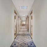 Hallway connecting treatment rooms throughout the dental office
