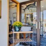 Welcoming entrance to the dental office with accessible doorway and reception area
